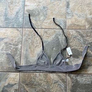 Swim top with adjustable ties in back and around neck